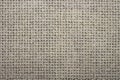 Beige texture in twisted mesh. Royalty Free Stock Photo