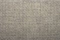 Beige texture in twisted mesh. Royalty Free Stock Photo