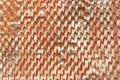 Beige textured background. Corrugated background on peach fuzz color. Ribbed pattern. Abstract paper background. Royalty Free Stock Photo