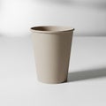 Beige Textured Paper Cup on White Surface in Studio Lighting Royalty Free Stock Photo