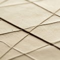 Beige textured paper featuring a crisscross pattern of embossed lines Royalty Free Stock Photo