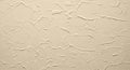 Beige textured stucco wall background for design use Royalty Free Stock Photo