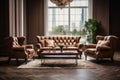 Beige tufted chesterfield sofa and brown wing chairs. Art deco interior design of modern living room