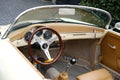 beige vintage porsche 356 Cabriolet cockpit, Retro luxury sports car which first produced by Austrian company Porsche, Oldtimer Royalty Free Stock Photo