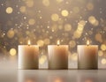 Beige or warm white color candles in festive bokeh background Royalty Free Stock Photo