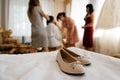 Beige wedding shoes in bride`s room close Royalty Free Stock Photo