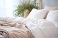 beige-white soft duvet lying against background of headboard with pillows,large green plant bedside table,concept of preparing for