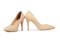 Beige woman shoes on a white