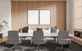 Beige and wooden meeting room with posters Royalty Free Stock Photo