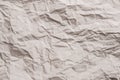 Beige wrinkled paper waste recycling background Royalty Free Stock Photo