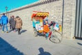 Nanlouguxiang pedicab or rickshaw tour in Nanlouguxiang Old Part area of the Beijing city centre Royalty Free Stock Photo