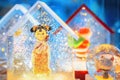 A Chinese doll in a snowglobe Royalty Free Stock Photo