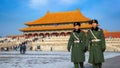 Unidentified Chinese military guards patrol on the courtyard of Taihedian Hall of Supreme Harmony