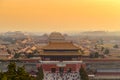 Aerial view of ancient palaces in the forbidden city in sunset background, Beijing, China Royalty Free Stock Photo