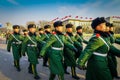 BEIJING, CHINA - 29 JANUARY, 2017: Chinese army soldiers marching on Tianmen square wearing green uniform coats and