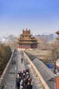 Tourists visiting ancient chinese architecture. historic buildings Imperial Palacewith Beijing
