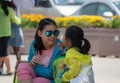 BEIJING / CHINA-JULY 30 2017: Two children are having fun and talking to each other. One of the children is wearing blue