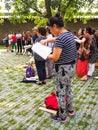 Group of middle aged and retired people singing in the park