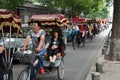 Beijing China tourists at rickshaw