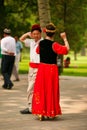 Beijing, China 07.06.2018 Woman in red dress and man dance in the park