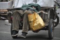 Beijing, Haidian District. man sleeping