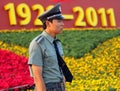 BEIJING - July 3: a soldier stands guard against the backdrop of