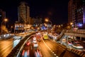 Beijing at night, driving cars on a busy road in the city