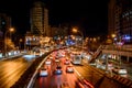 Beijing at night, driving cars on a busy road in the city