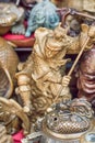Close-up of sculptures displayed on Panjiayuan market, Beijing, China