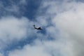 The plane flying over Shchelkovo City. Royalty Free Stock Photo