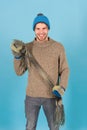 Being in playful mood. men knitted cloth and accessory. male blue background. poor homeless man. cheerful man feeling