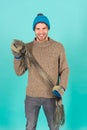 Being in playful mood. men knitted cloth and accessory. male blue background. poor homeless man. cheerful man feeling