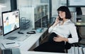 Being pregnant has taught me to be patient. an attractive pregnant businesswoman sitting alone in the office and using