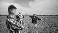 Being together. happy man and woman in love enjoy spring weather. happy relations. girl and guy in field with camera Royalty Free Stock Photo