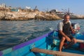 BEIRUT, LEBANON - AUGUST 14, 2014: Unknown man on a boat in the Mediterranean Sea near the coast of Lebanon in the area of Raouche