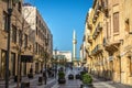 Beirut, Lebanon - Feb 5th 2018 - Locals walking in a new, modern area of Beirut downtown in a blue sky day, mosque minarete in the Royalty Free Stock Photo