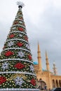Decorated Christmas tree, mosque and church