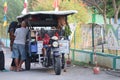 a vegetable seller with a motorbike in the afternoon Royalty Free Stock Photo