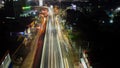 Light trails on motorway highway at night, long exposure abstract urban background at Bekasi