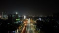 Light trails on motorway highway at night, long exposure abstract urban background at Bekasi Royalty Free Stock Photo