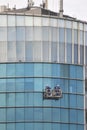 Bekasi, West Java, Indonesia, March 5th 2022. The workers of sky service are cleaning the windows of the tower building