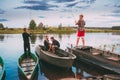 Belarus. Belarusian Children Fishing From Old Wooden Row Boats Royalty Free Stock Photo