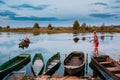 Belarus. Belarusian Children Fishing From Old Wooden Row Boats Royalty Free Stock Photo