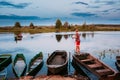 Belarus. Belarusian Children Fishing From Old Wooden Row Boats During Summer Royalty Free Stock Photo