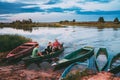 Belarus. Belarusian Man And Two Boys Children Floating In Old Wooden