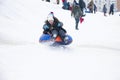 Children play around in the snow Royalty Free Stock Photo