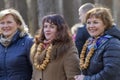 Women with bagel bundles celebrate the Russian holiday Maslenitsa