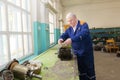 Electrician repairs an old electric motor