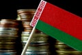 Belarus flag waving with stack of money coins Royalty Free Stock Photo