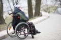 A man in the street in a wheelchair Royalty Free Stock Photo